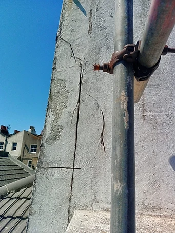 Parapet dome — render removed in sections, mesh reinforcement exposed