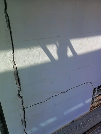 Before: full scaffold elevation — prior to prep and paint works
