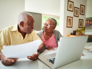Couple planning for retirement with an advisor