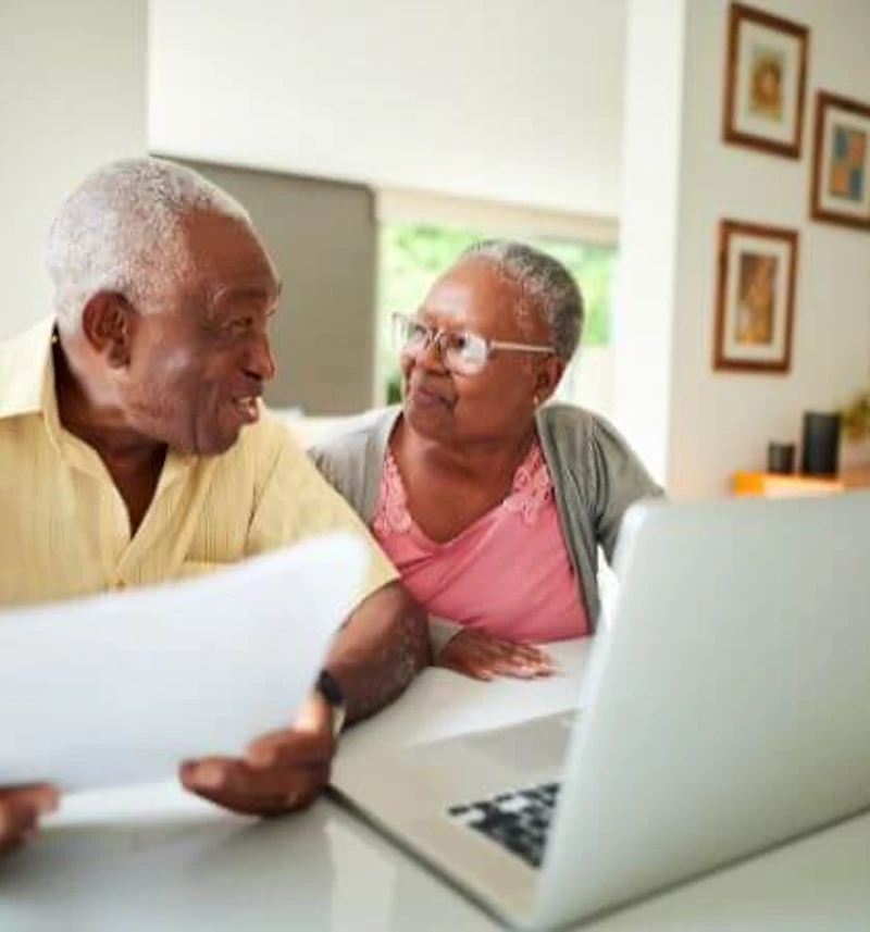 Happy retired couple embracing