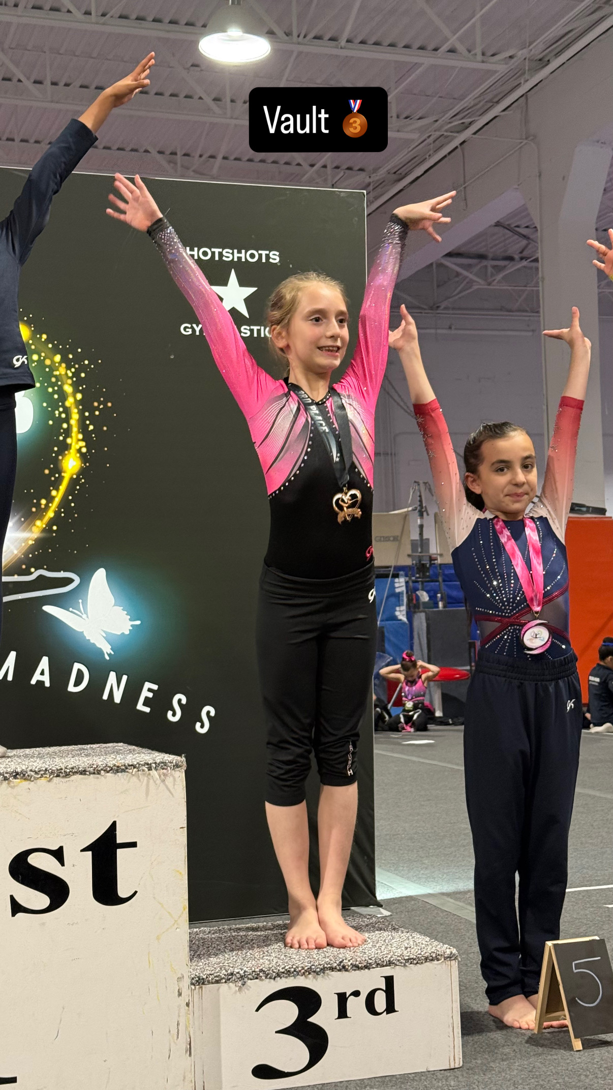 Gymnasts on New York State Championship awards stage