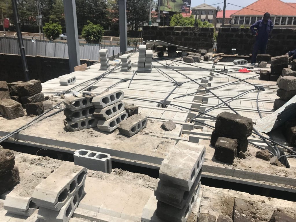 Hollow blocks laid between precast beams