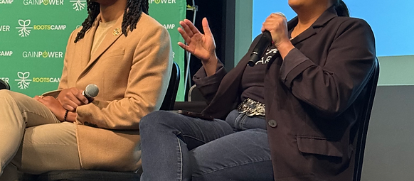 A panel discussion at RootsCamp