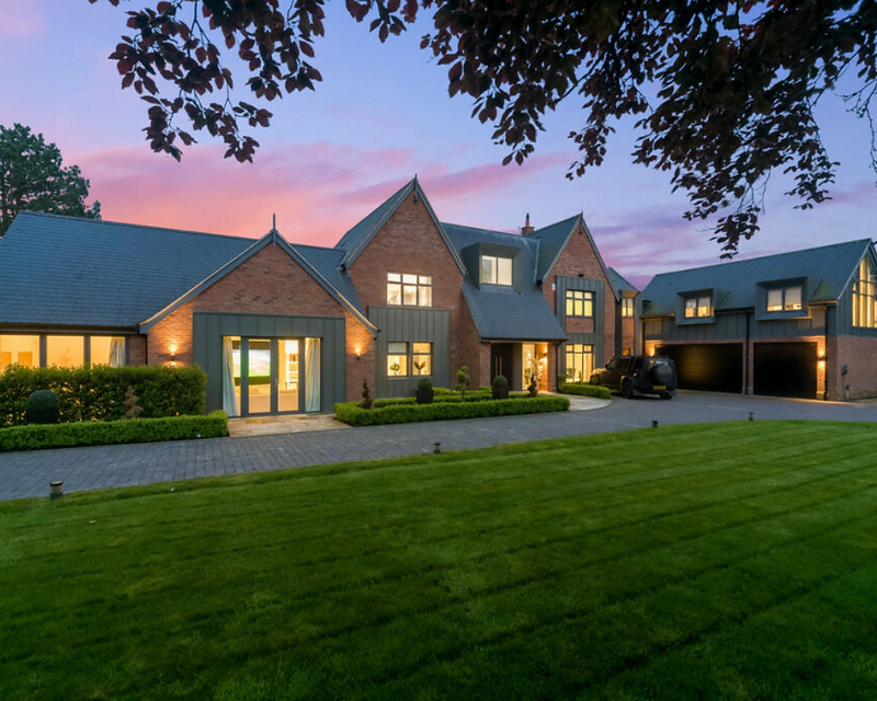 Contemporary residence at dusk in Cheshire