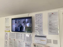 Office monitor showing a live multi-camera grid