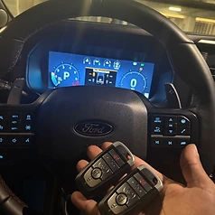 Ford truck interior with two newly programmed key fobs by 3 Locksmiths