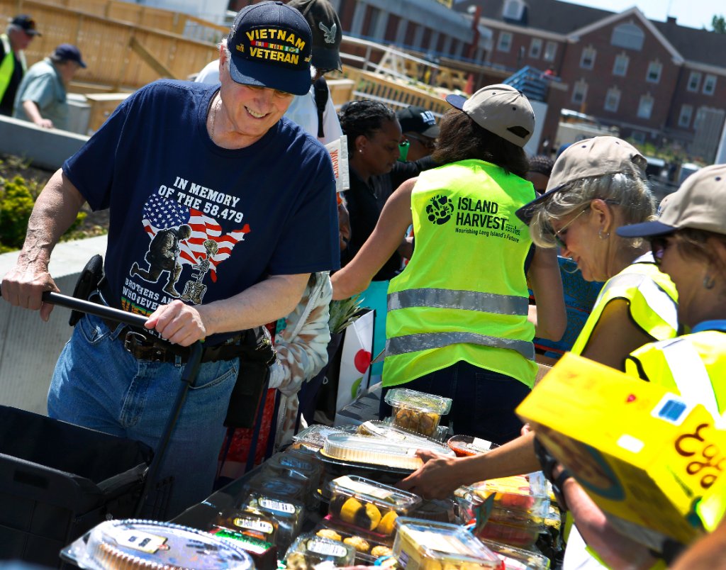 A Vietnam veteran receives food at an Island Harvest distribution