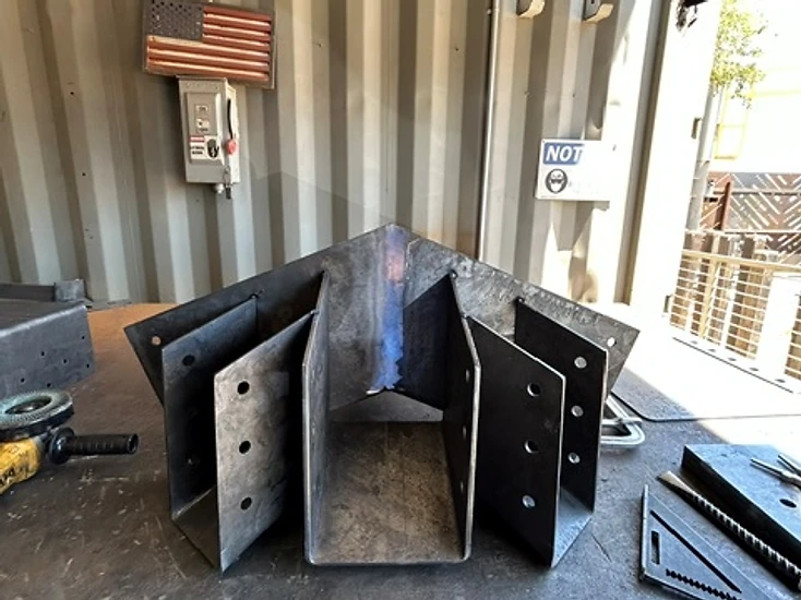 Stainless steel brackets and cut components produced by KorFab