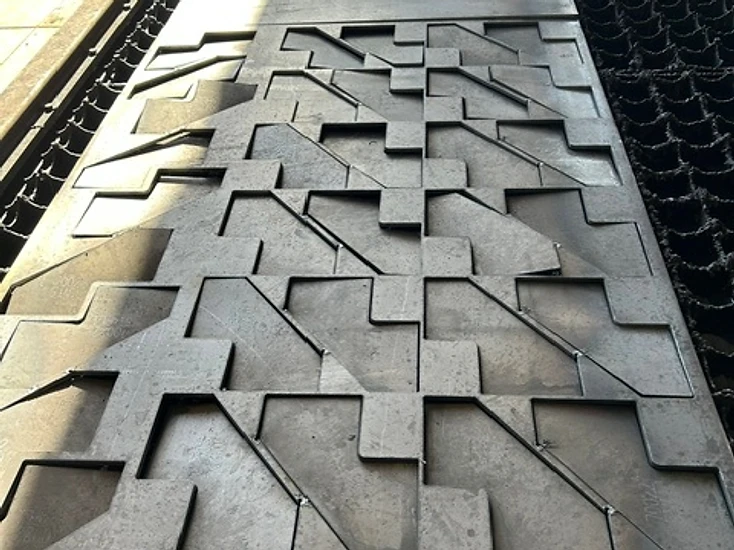 Custom cut metal brackets and components fabricated by KorFab