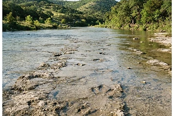 Glen Rose — Dinosaur tracks in a limestone riverbed and a 1,800-acre drive-through wildlife park.