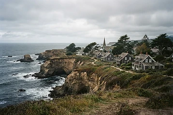 Mendocino — Saltbox Victorians on a cliff, the most beautiful town in Northern California.