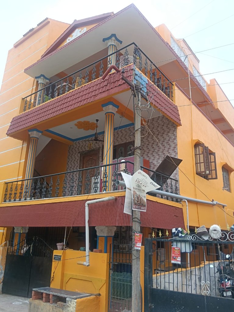 Sri Lakshmi Chennakesava PG building exterior in Sholinganallur, Chennai