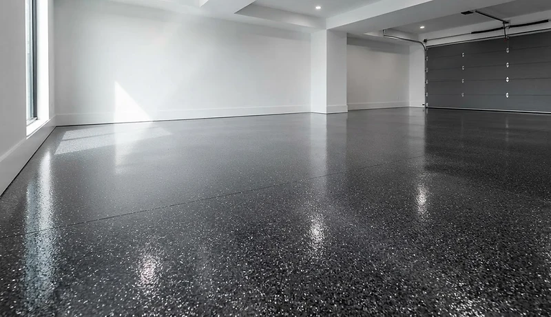 Charcoal and silver polyaspartic garage floor coating in Muskoka