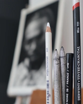 Charcoal, graphite, dust.