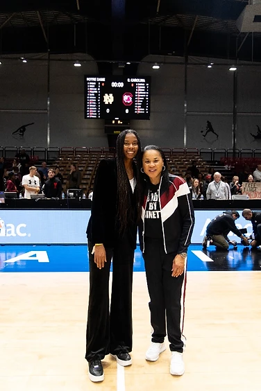 Anaïa with a player on the Notre Dame vs. South Carolina court in Paris