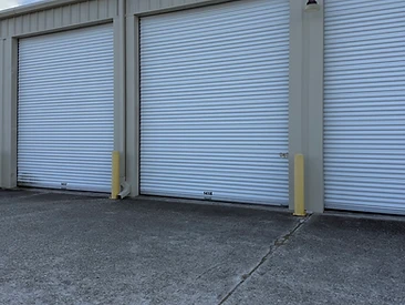 Garage-size drive-up storage units with roll-up doors at Challenger Storage in Webster, TX