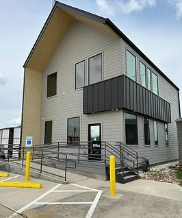 Challenger Storage office building entrance with reserved parking