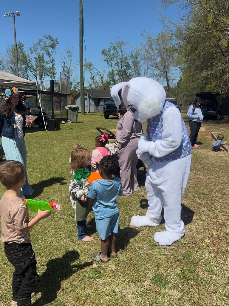 Children meeting Easter Bunny character
