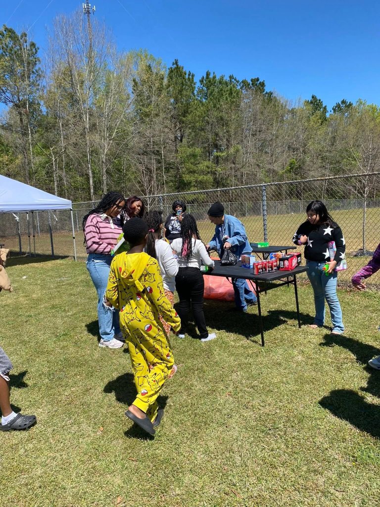 Kids at outdoor event tables
