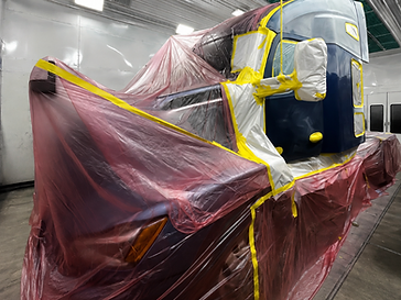 Truck cabin prepped for painting in the Truck World paint booth