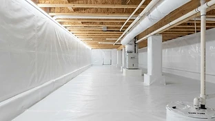 Clean, encapsulated crawlspace with vapor barrier