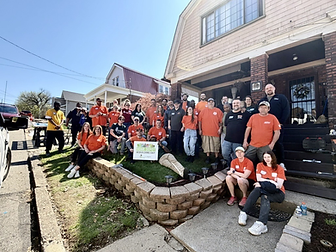 Corporate volunteers gathered for a rebuilding day