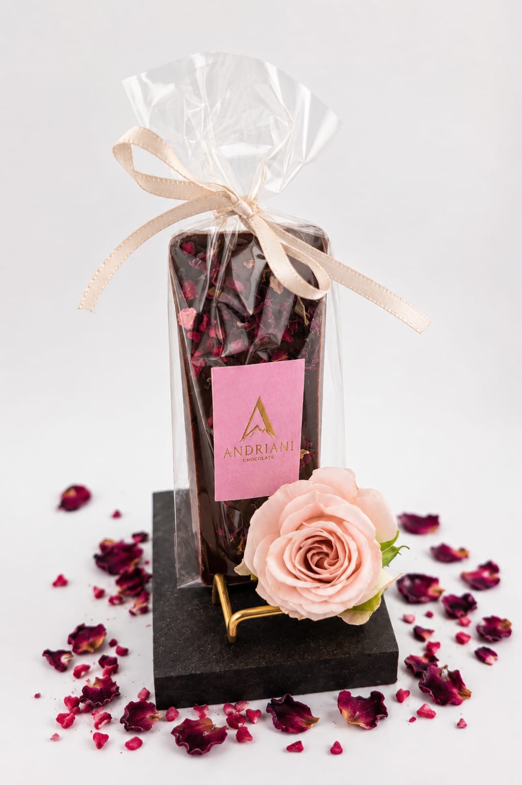 Milk chocolate bar topped with dried rose petals