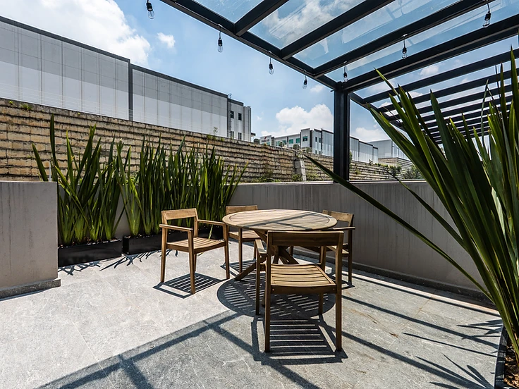 Terraza de una casa Maple en Bosque Esmeralda