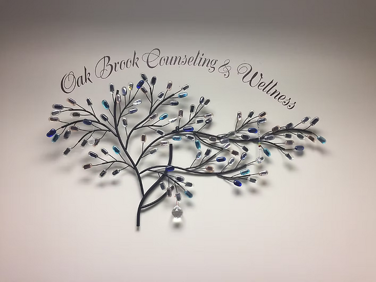 Oak Brook Counseling and Wellness wall artwork displayed in the practice