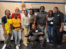 A school team posing together during a workshop