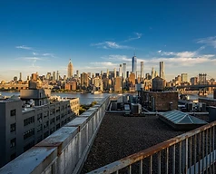 New York City skyline viewed from Queens rooftops