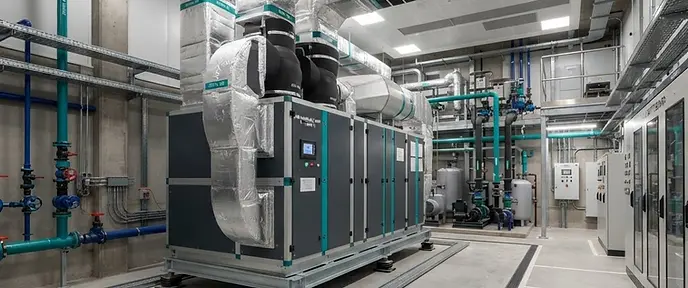Rooftop air handling unit and ventilation ductwork on a commercial building