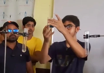 Student examining results during a practical session