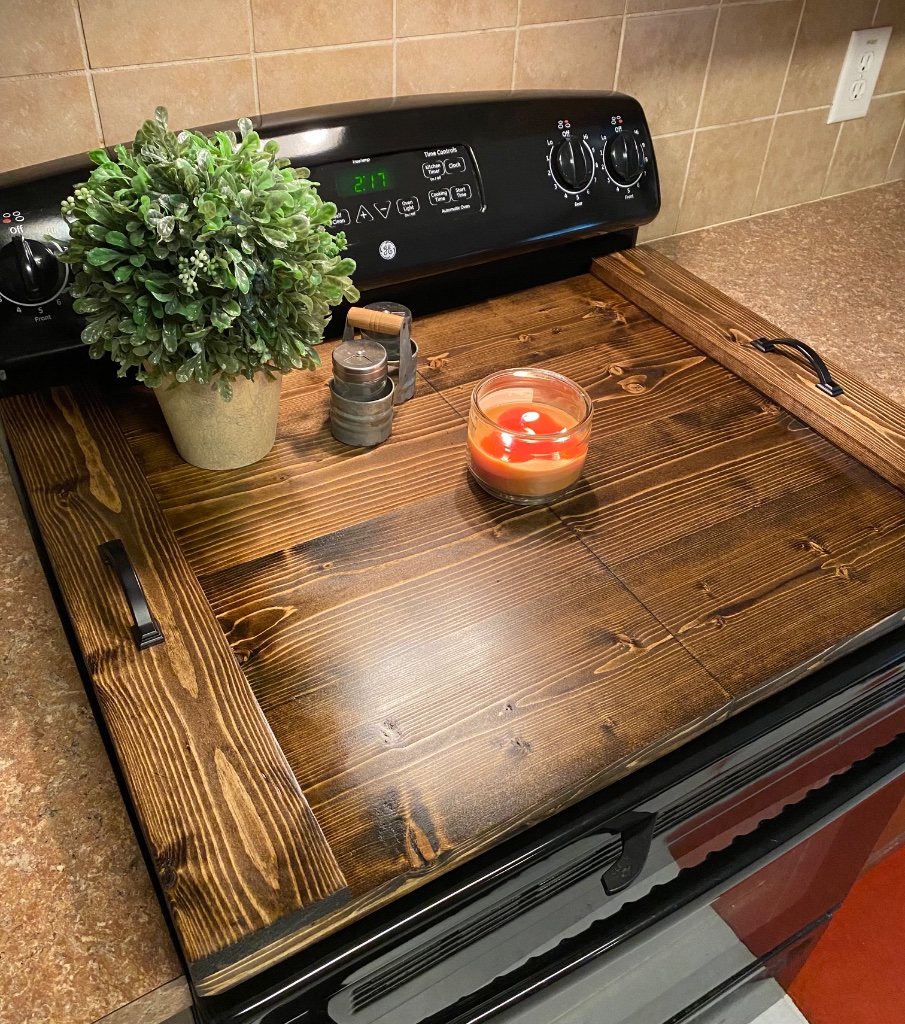 CounterKind foldable wooden stove cover in a kitchen