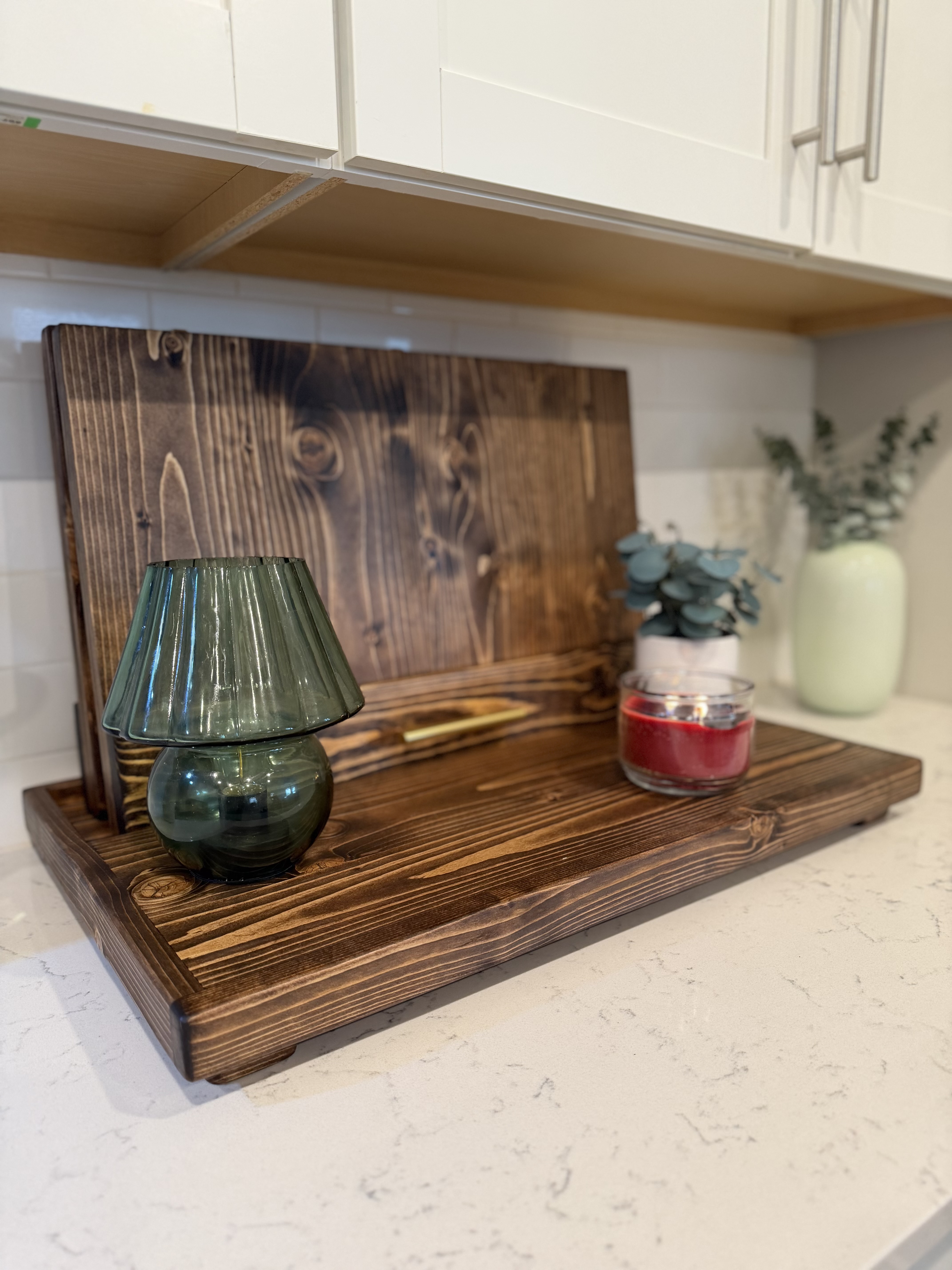 CounterKind foldable wooden stove cover in a kitchen