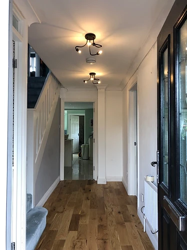 Hallway renovation — completed: all main tasks done, new hardwood flooring installed, decorated to a white base coat ready for clients to finish in their own colours
