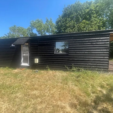 The black lodge — modern studio & one-bed