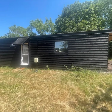 The black lodge — modern studio & one-bed