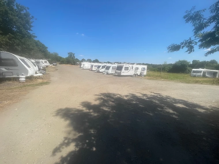 Touring caravans lined up at Willows