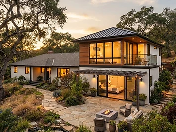 Modern home addition wing with large windows at evening light in an East Bay neighborhood