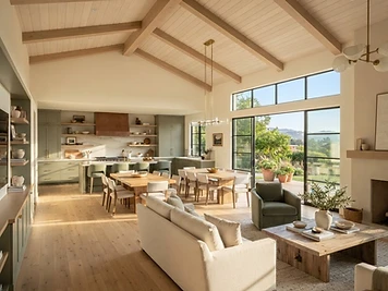 Open living space in a remodeled California home with white oak beams and natural light