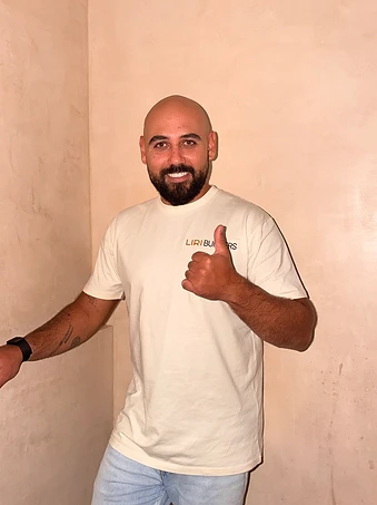 Ariel Ben Shimon wearing a Liri Builders shirt