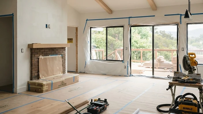 Whole-home remodel in progress with floor protection