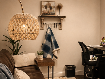 A private ElmWorks office nook with a tufted leather sofa and warm lighting