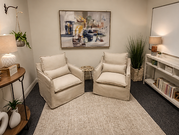 A welcoming meeting room at ElmWorks with upholstered armchairs