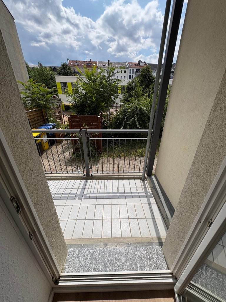 Zimmer mit Balkonzugang