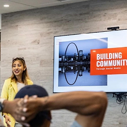 Mihika Nagpal speaking at a community presentation
