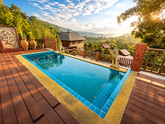East-Facing Pool Terrace A peaceful terrace with a private pool and panoramic mountain views, especially beautiful in the soft morning light.