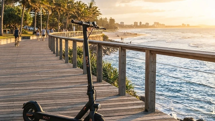 Electric e-scooter parked on a sunny Australian coastal boardwalk, eco-friendly transport giveaway