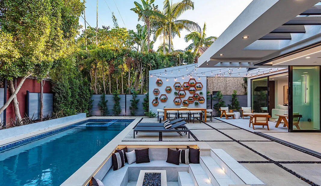 The pool and the sunken lounge, with the planter wall and the covered terrace beyond, La Jolla North in West Hollywood by Apel Design